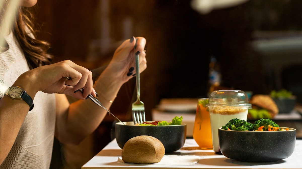 Woman preparing nutritious meal in modern kitchen